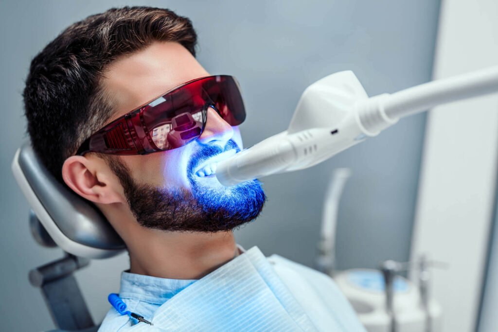 Cameron Park Cosmetic Dentistry offers teeth whitening services to a male patient