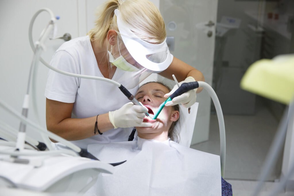 family dentist in Placerville, CA, working on a woman's mouth